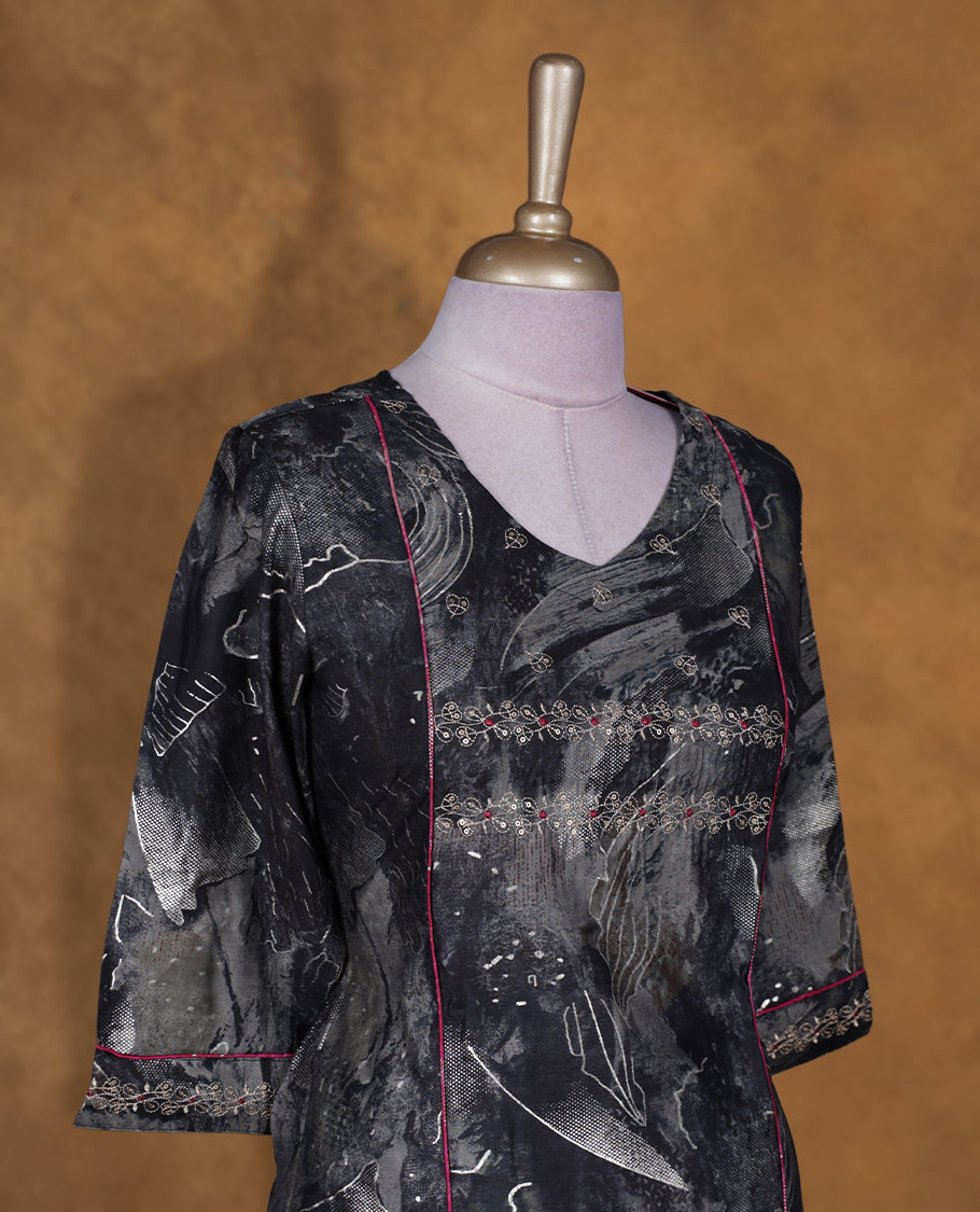 Black colour tie dye kurti BY TALISHA with abstract grey patterns, flared calf length silhouette, round neckline, three quarter sleeves, and contrast piping detail.