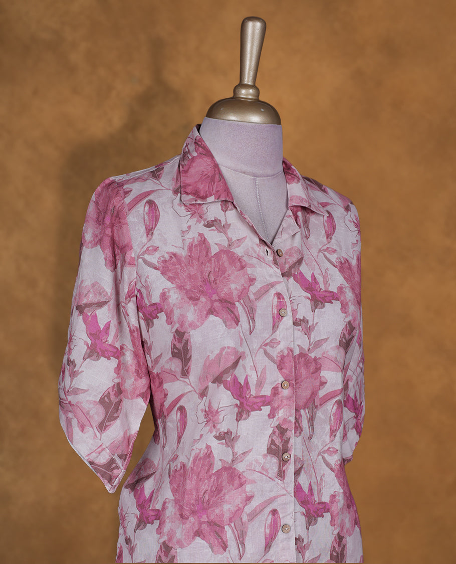 Pink floral colour BY VISMAY button down kurti with an all over rose toned print, straight calf length silhouette, classic shirt collar, and elbow length sleeves.