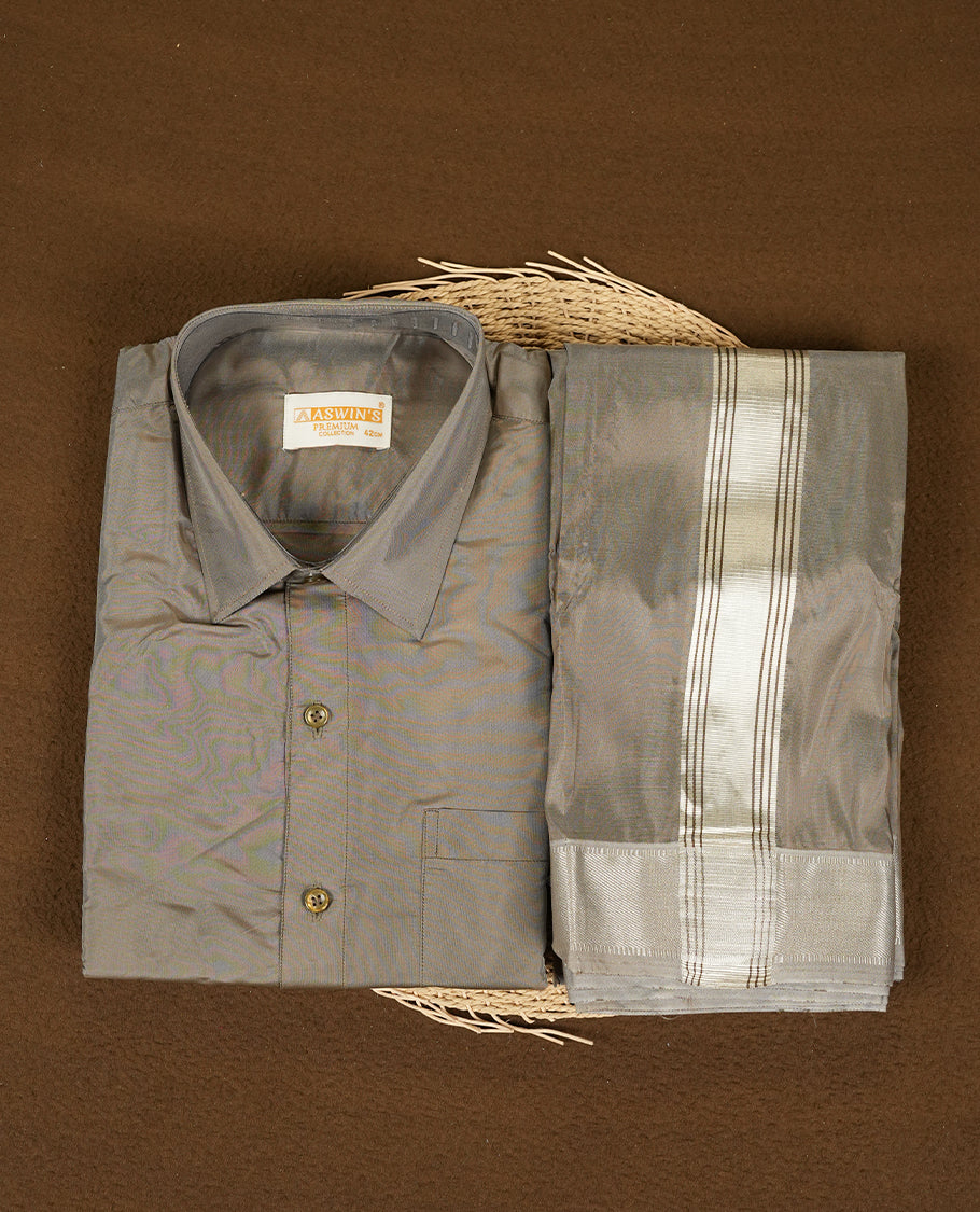 Chocolate colour Aswin’s wedding set featuring a refined silk shirt and matching dhoti with gold zari detailing, crafted for timeless elegance and perfect for traditional weddings and festive occasions.