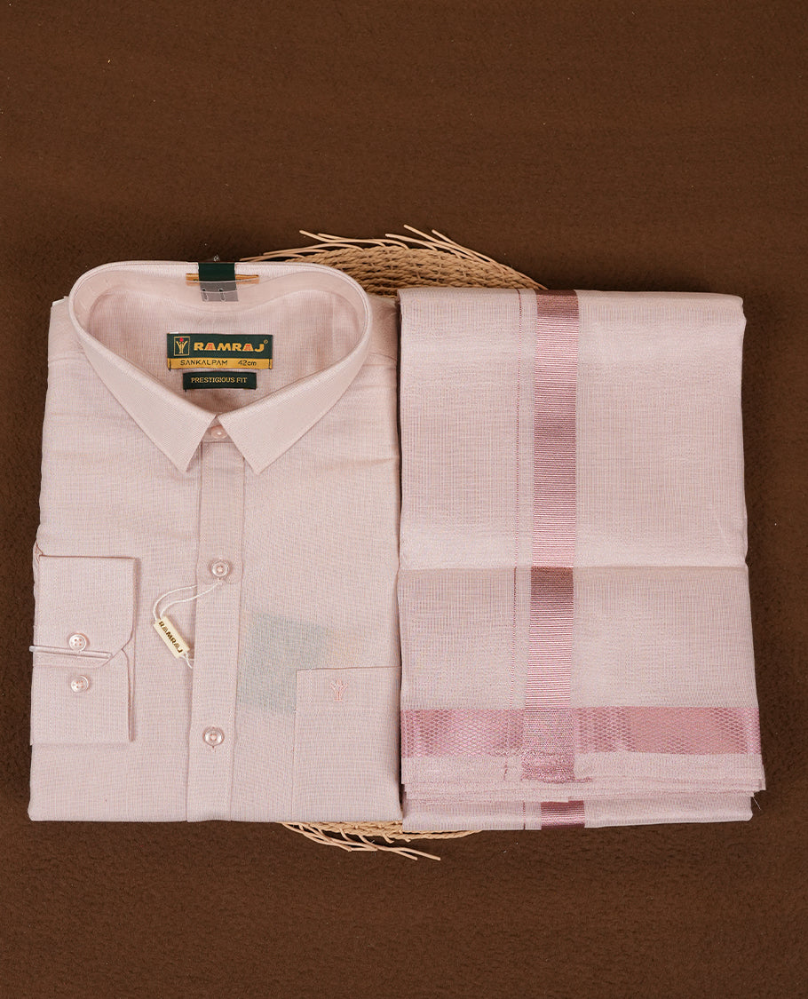 RAMRAJ Rose Gold Colour shirt paired with a matching dhoti, elegantly finished with a Rose gold border.