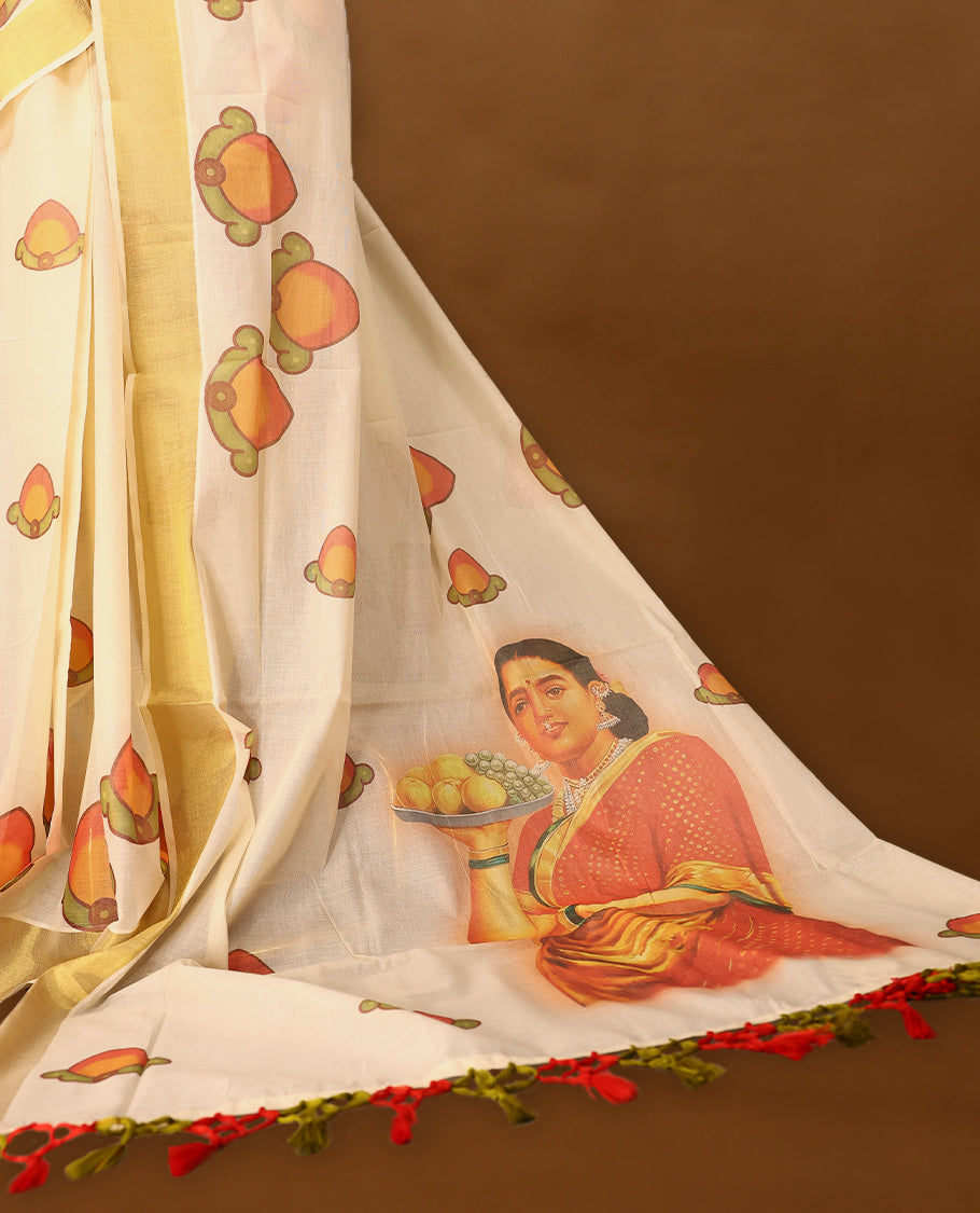 Kerala cotton saree with fine Prints and a Golden lustrous zari border with Matching Blouse
