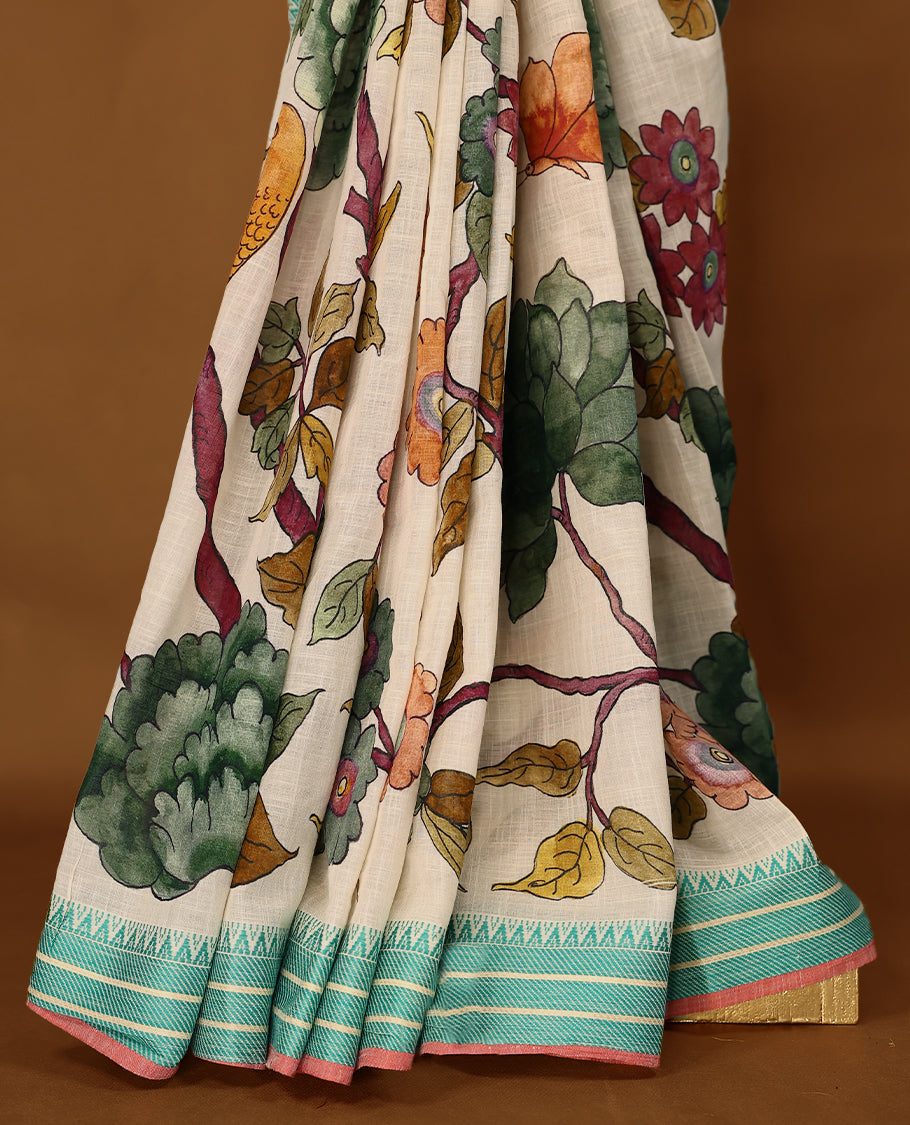 Off-white Colour lightweight khadi cotton saree featuring earthy-coloured digital floral kodi prints on the body, accented with an aqua green border, and paired with a matching blouse.