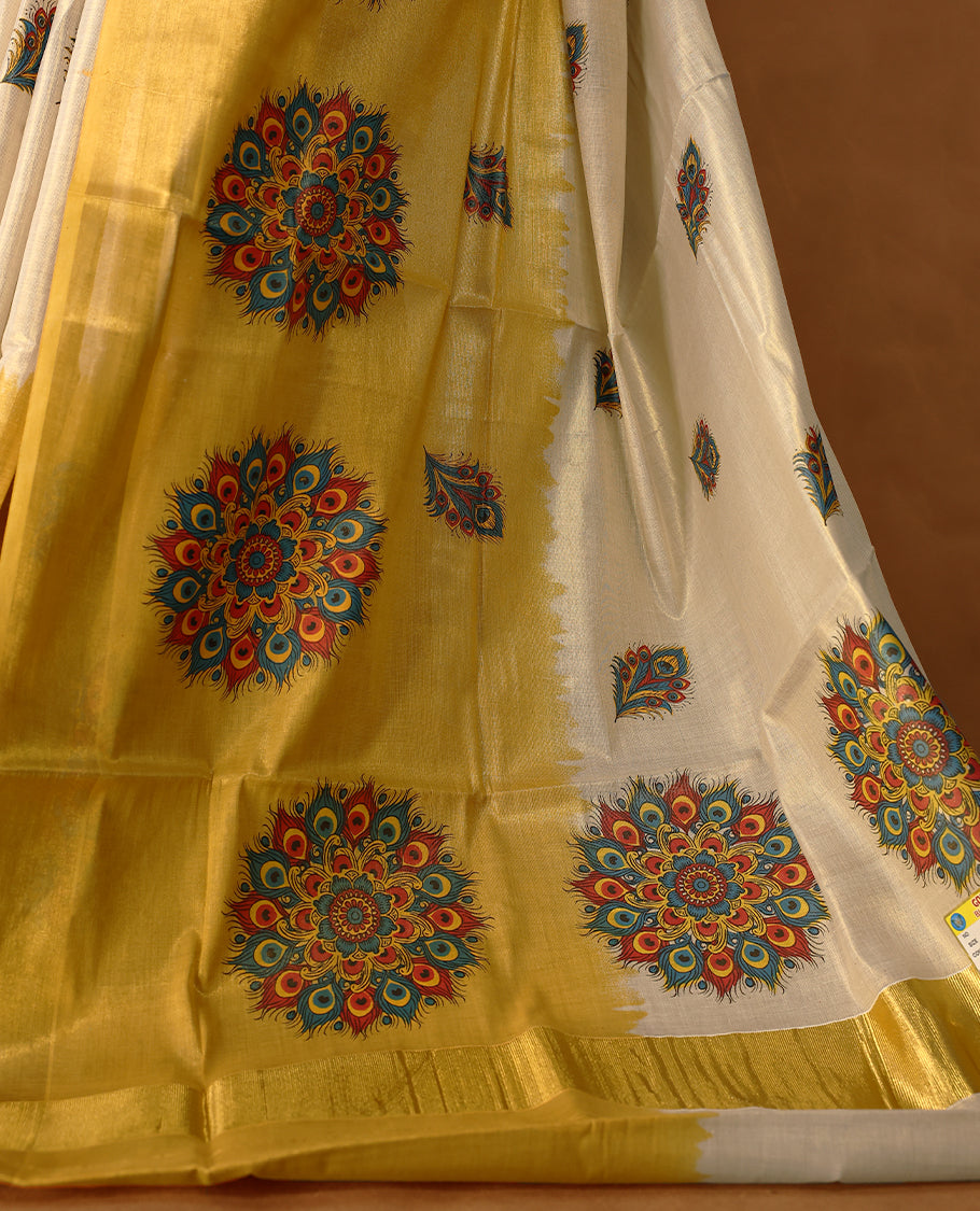 Mustard & Light Gold colour Tissue Kerala saree featuring Bold Floral Printed body and traditional golden zari kasavu border offering a classic and graceful look, paired with a matching blouse.