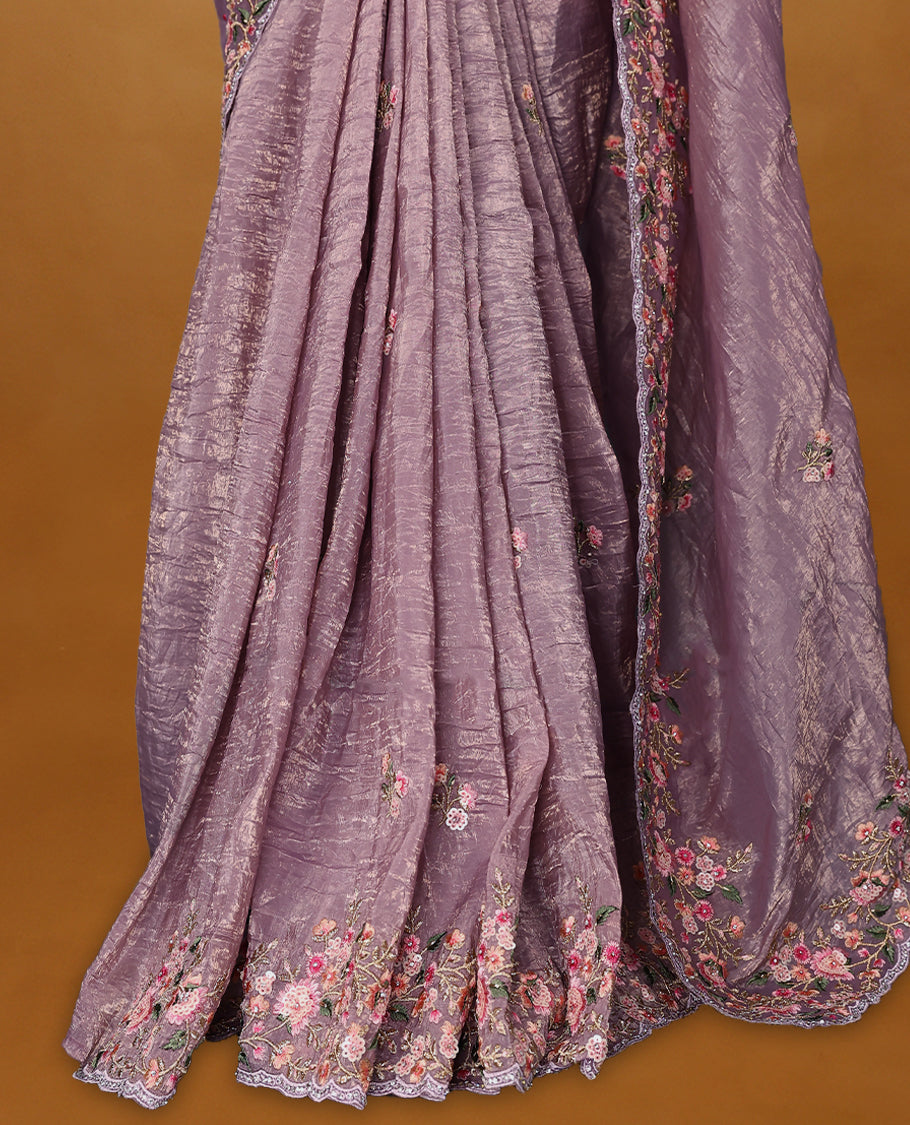 Mauve Crush Soft Silk saree featuring Floral Thread Works on the body, complemented by delicate embroidery in pink and green tones border and a matching blouse.