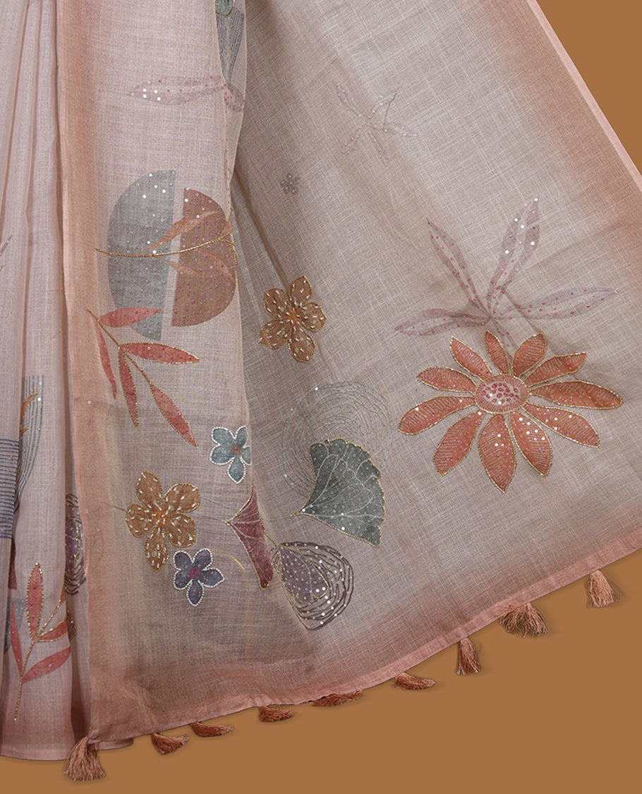 Light peach colour Linen saree featuring Peach colour fade border with floral beats pattern around floral print across body without border, pallu and matching blouse piece.