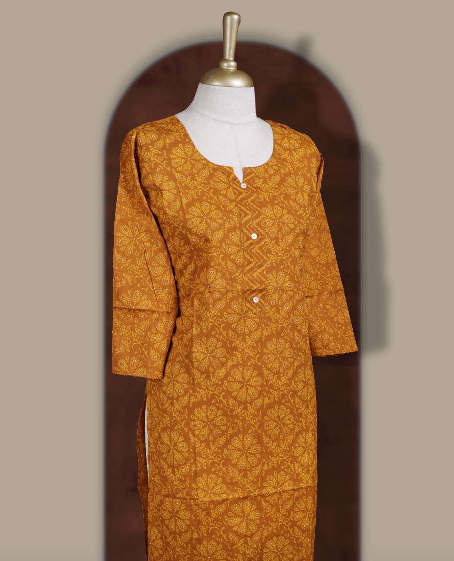 Mustard yellow colour kurti adorned with all over floral prints, featuring a stylish V notch round neckline and comfy 3/4th sleeves for a graceful ethnic look.