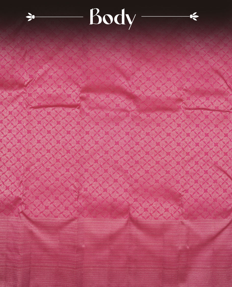 Rani pink colour Kanchipuram pattern Manthrakodi saree featuring geometrical design antique gold zari jacquard design across the body, turning zari border, and plain jacquard blouse piece.