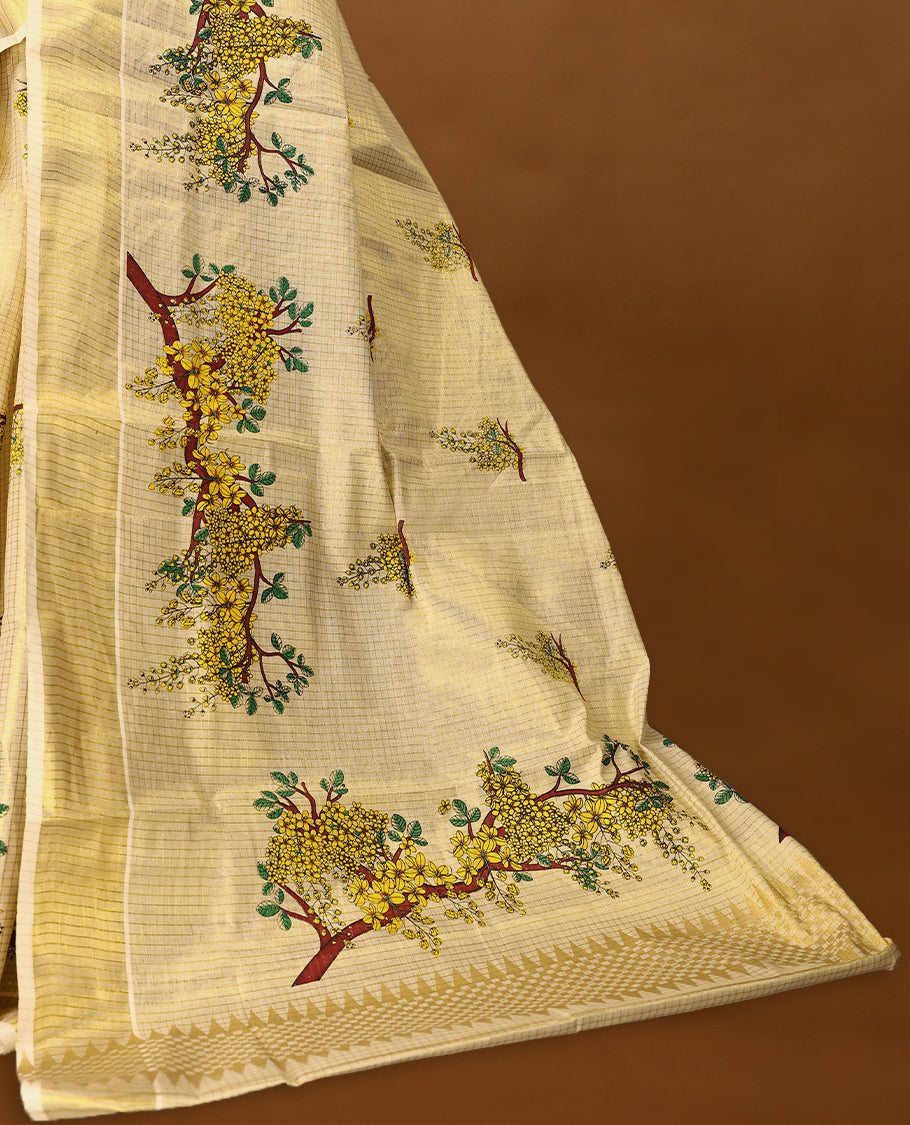 Golden Kerala Tissue saree adorned with vibrant tree-floral motifs and subtle golden border with Matching Blouse