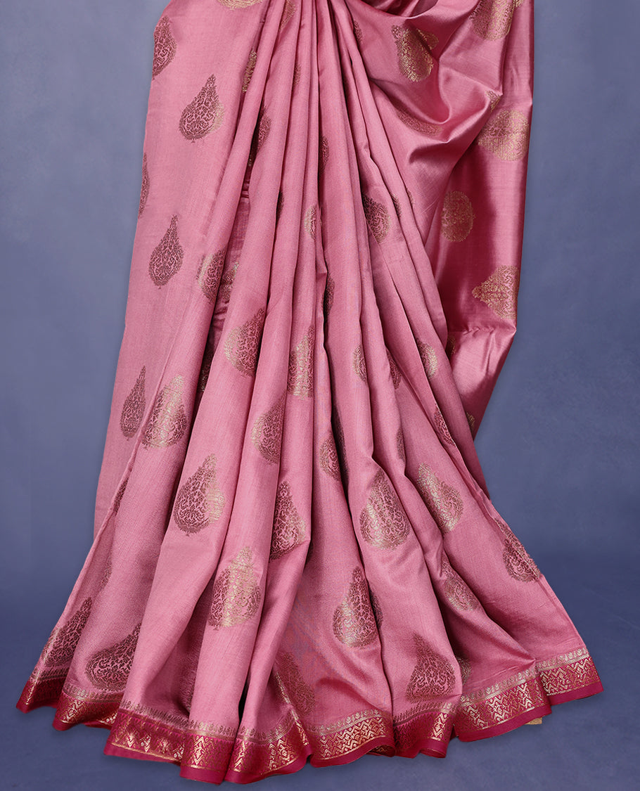 Onion Pink Colour Pure Banaras Soft Silk Saree adorned with traditional antique zari motifs, paired with a hand dyed Dark Magenta antique style border and a matching blouse.