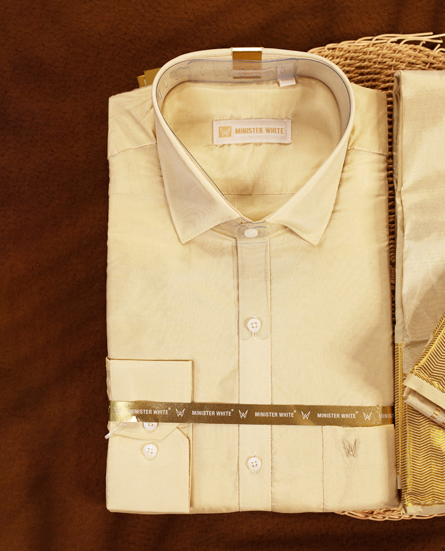 Fawn gold coloured silk wedding shirt, dhoti, and towel set from MINISTER WHITE, embellished with a classic gold zari border, perfect for weddings, festive functions, and traditional occasions.