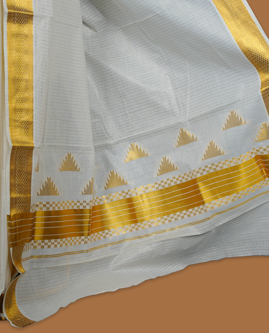 Off-white colour Kerala cotton saree with fine striped texture, rich golden zari border, and traditional motif pallu, paired with a matching blouse.