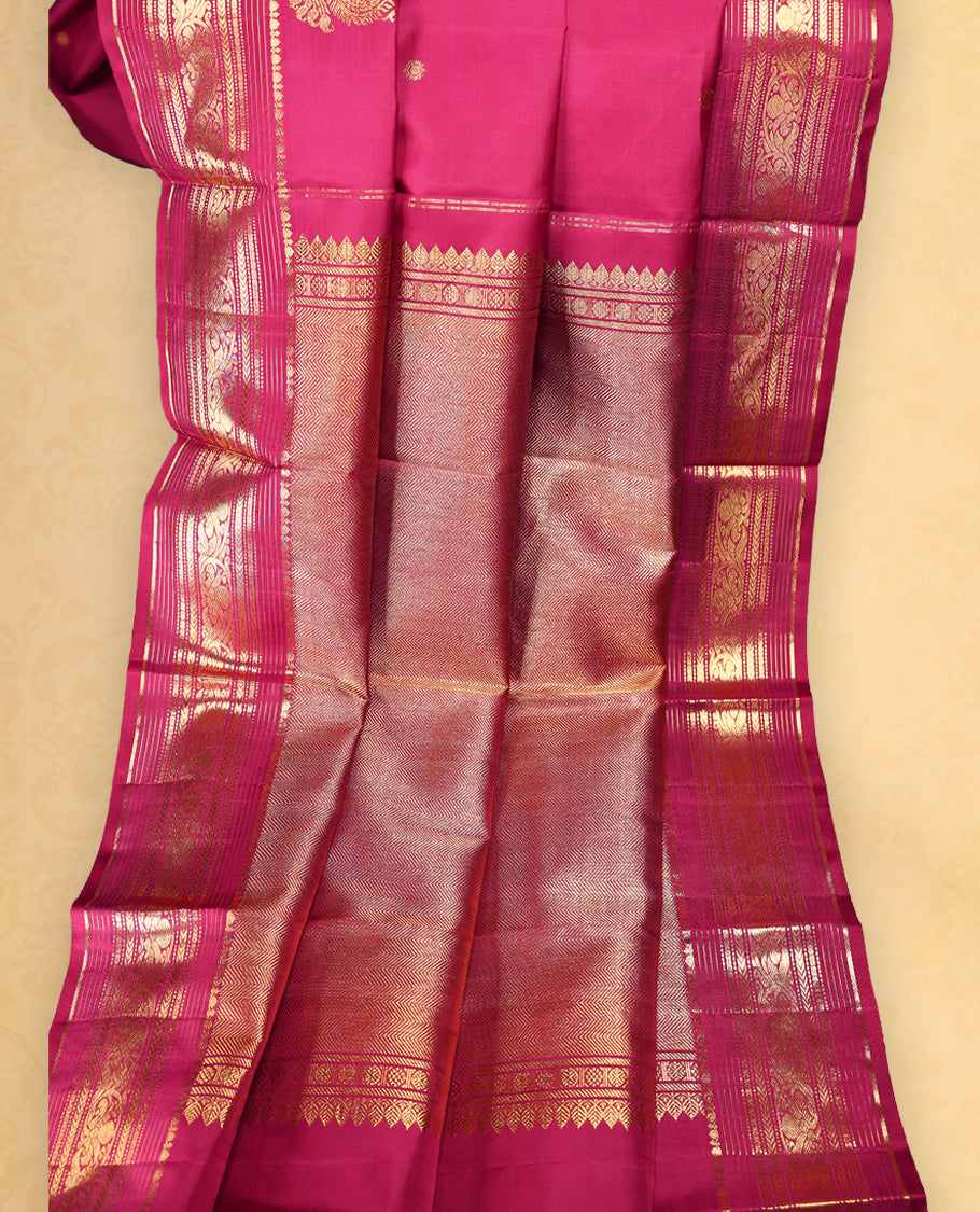 Araku colour pure Kancheepuram saree with gold zari small chackra motifs on the body traditional border with Meena mango motifs grand pallu with Vangi design paired with matching blouse