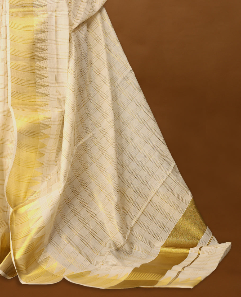 Kerala cotton saree with golden triangle border detailing and subtle checks with Matching Blouse
