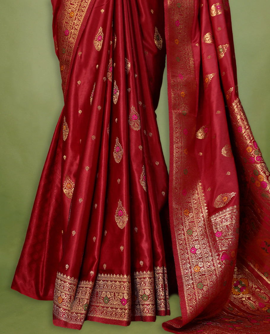 Dark Red Colour Semi Banarasi Saree having Golden Buttas in Body with Worked Border and Blouse