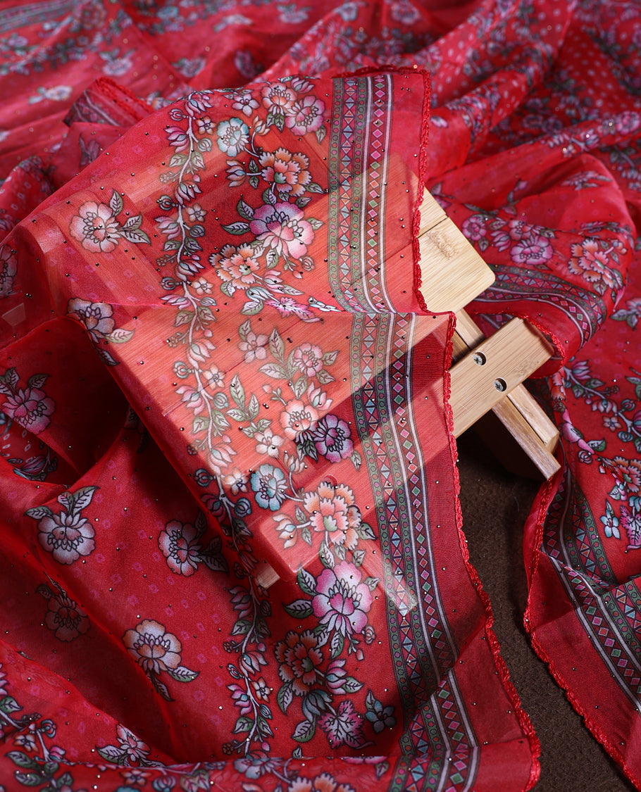 Rose red colour churidhar material adorned with delicate floral, stone and vine prints, enhanced by a contrast border & Paired with a plain matching bottom, perfect for festive wear and casual elegance.