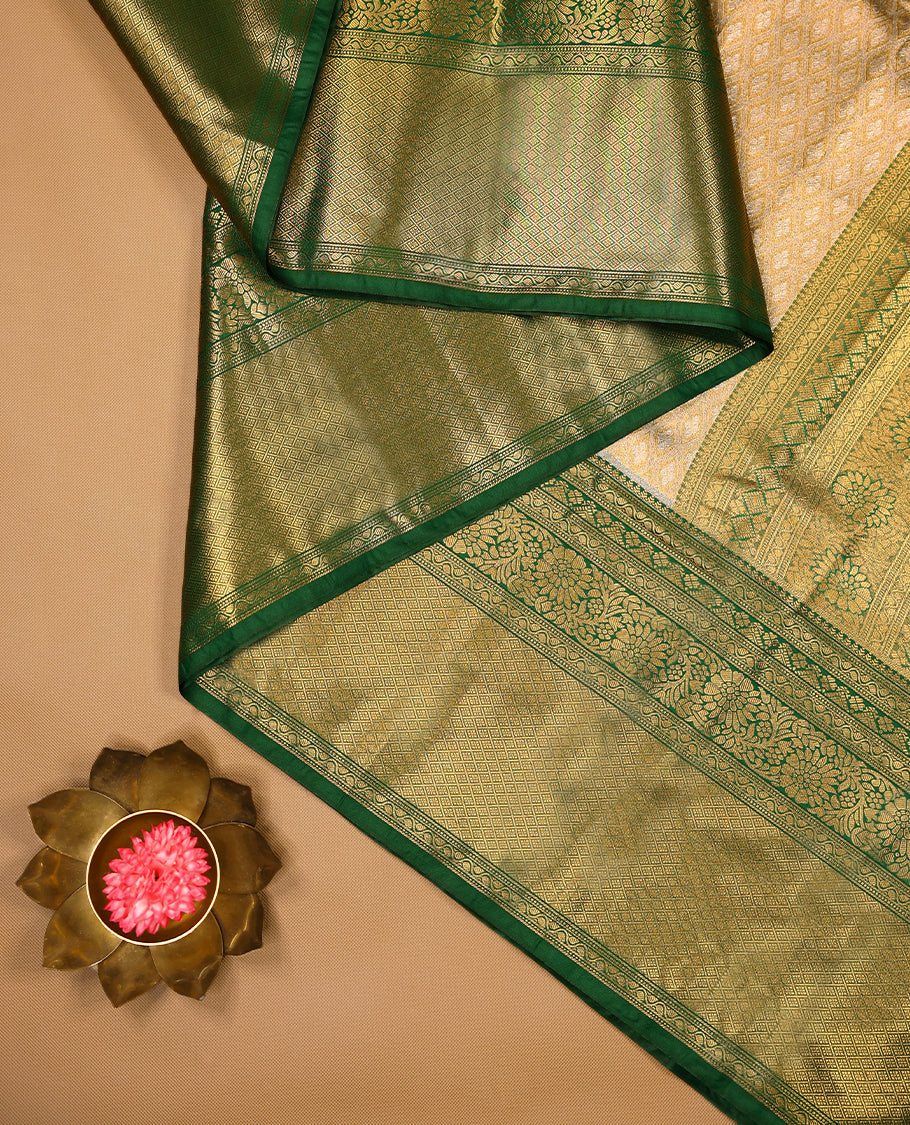 Golden Colour Tissue Semi Silk Saree having Silver Zari Worked Body and Blouse with Green Border