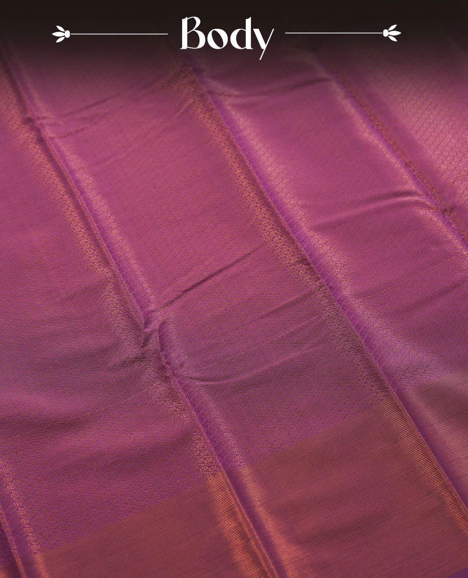 Deep purple colour semi silk saree featuring neem zari Brocade Pattern all over the body, complemented by a Self Colour woven border with detailing with contrast green Colour Pallu & blouse.