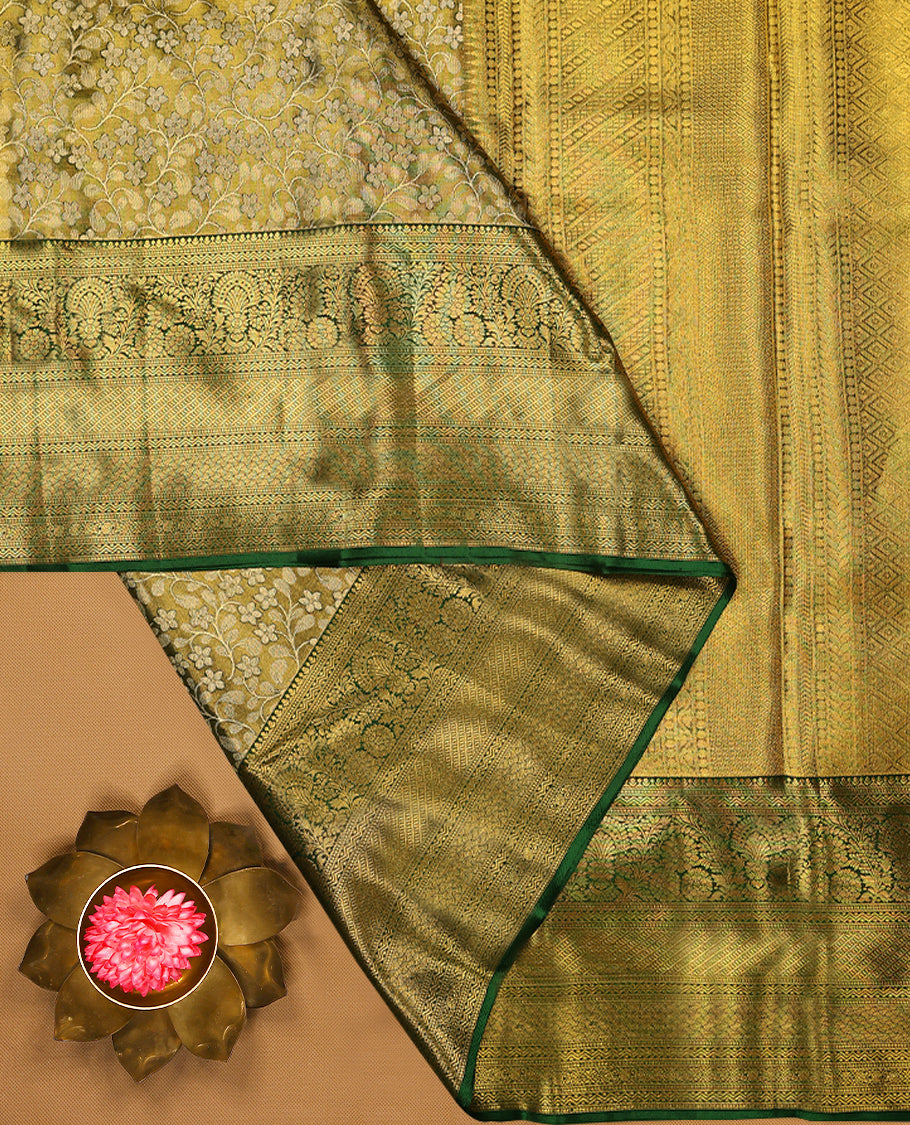 Green Colour Pure Tissue Wedding Saree having Zari Jaal Body with Dark Green Brocade Border and Blouse