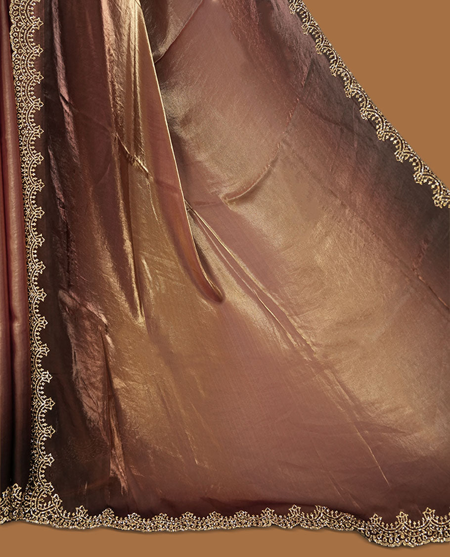 Dark Brown colour net shimmer fancy saree with a plain body, paired with a delicate stone worked border, with matching blouse