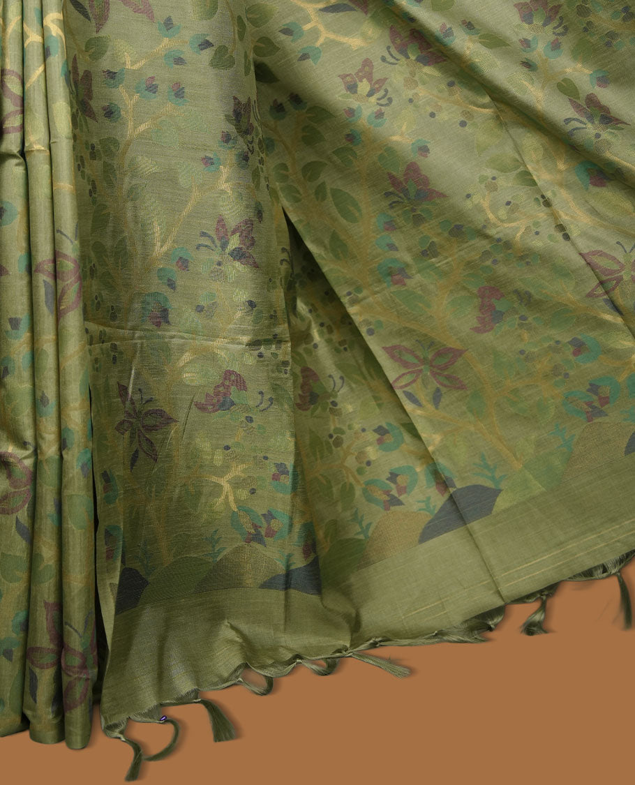 Light green colour semi jamdani tussar silk saree featuring woven Floral kodi & butterfly motifs on the body, complemented by a self colour without border pallu, paired with a matching blouse.