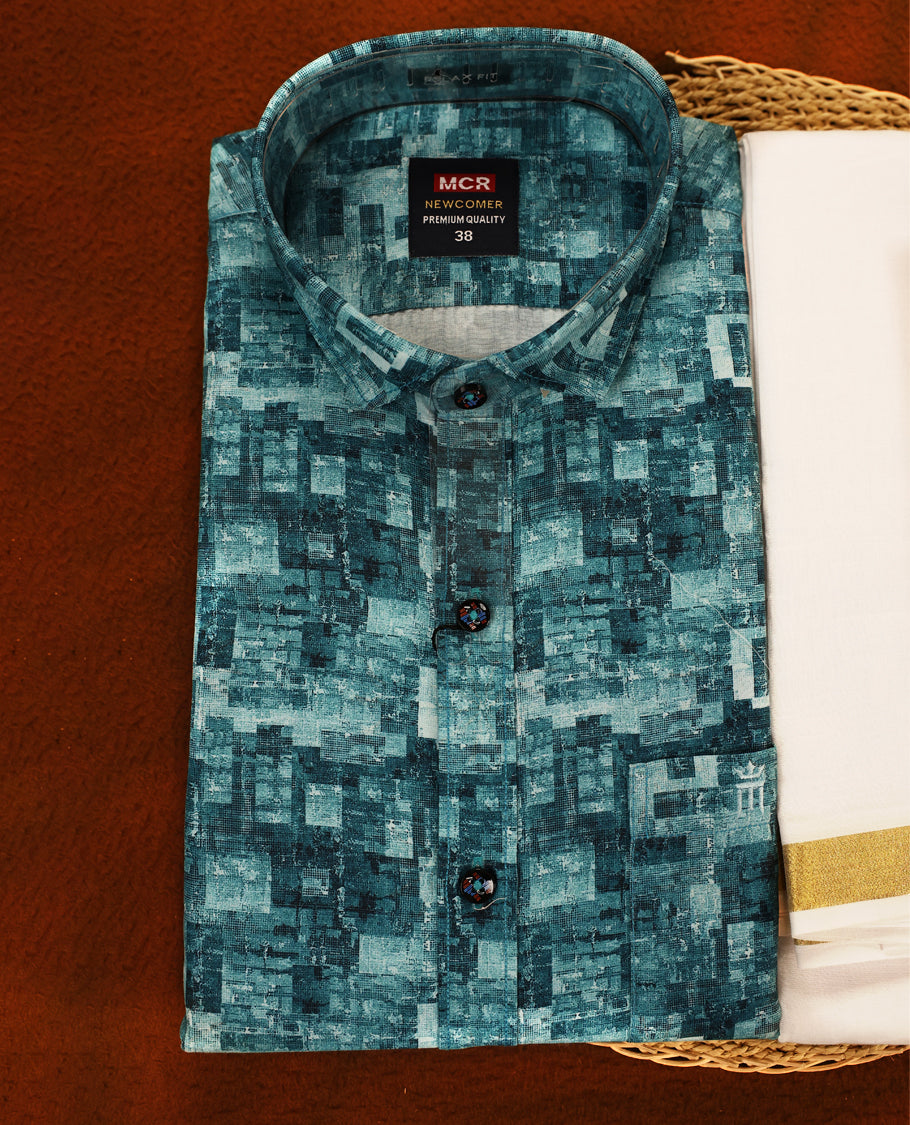 Pastel Aqua colour MCR full sleeve shirt featuring all over abstract prints, paired with a white dhoti adorned with a rich golden zari kara and a matching printed border.