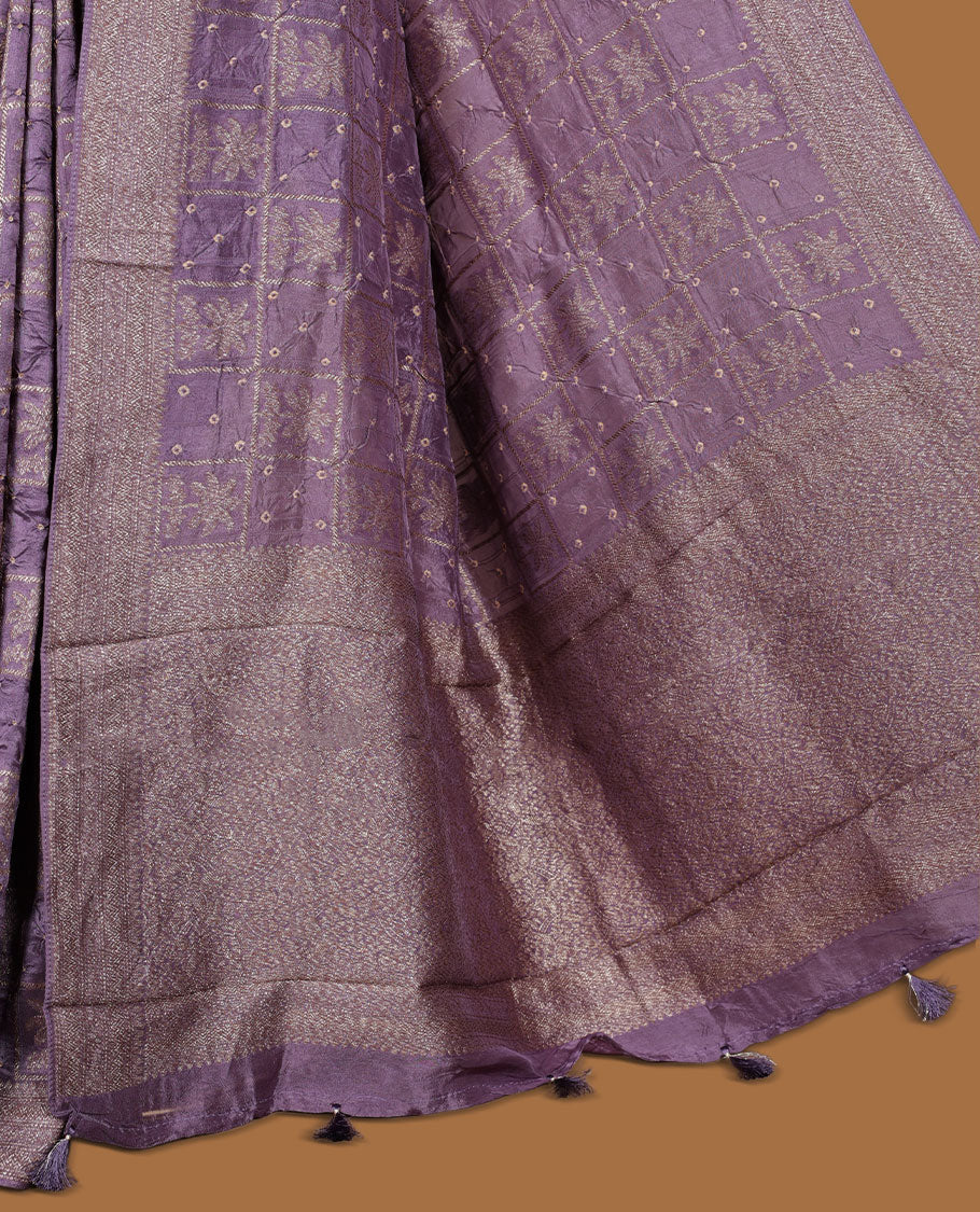 Dark Lavender colour Banarasi Bandhani silk saree featuring with intricate Banarasi motifs on body, complemented by antique zari woven border and grand pallu, paired with matching blouse