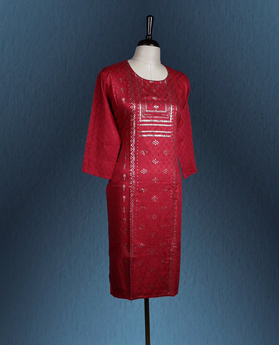 Dim red colour kurti with an all over subtle geometric weave, accentuated by an ornate golden printed front panel, featuring a round neckline and elegant three quarter sleeves