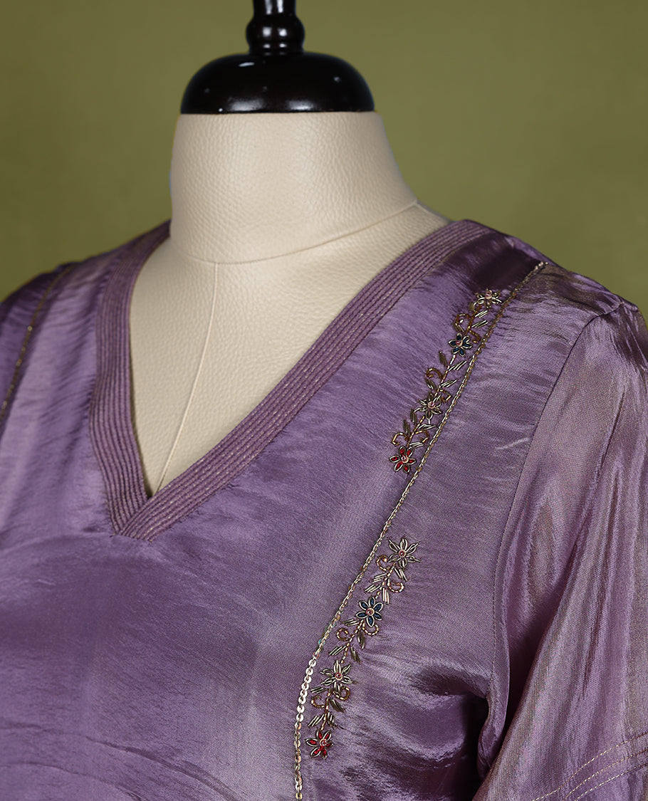 Pastel Purple coloured stylish kurthi without slit, featuring a V neck design adorned with intricate cut bead, sequin, and thread work, for women