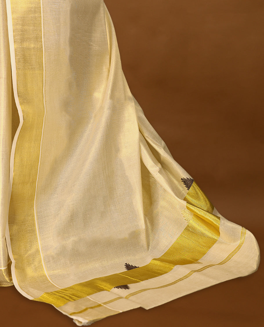 Kerala tissue saree, beautifully accented with a lustrous golden border having subtle temple motifs with Matching Blouse.