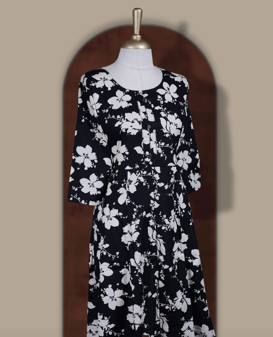 Black colour kurthi featuring with beigecolour floral prints all over & Designed with a round neckline, button placket, and 3/4 sleeves.