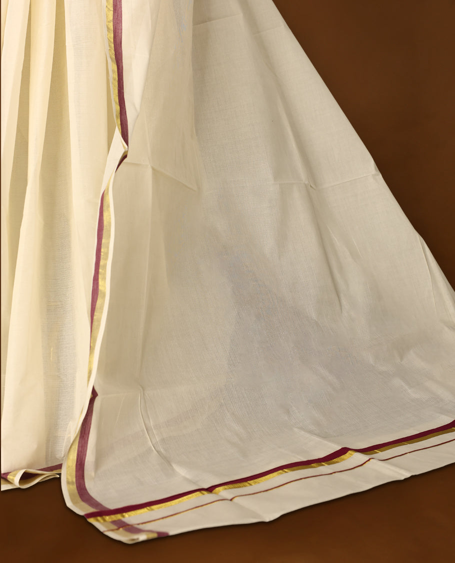Elegant off white colour cotton Kerala saree featuring a plain body and traditional golden zari border with a hint of maroon, offering a classic and graceful look, paired with a matching blouse.
