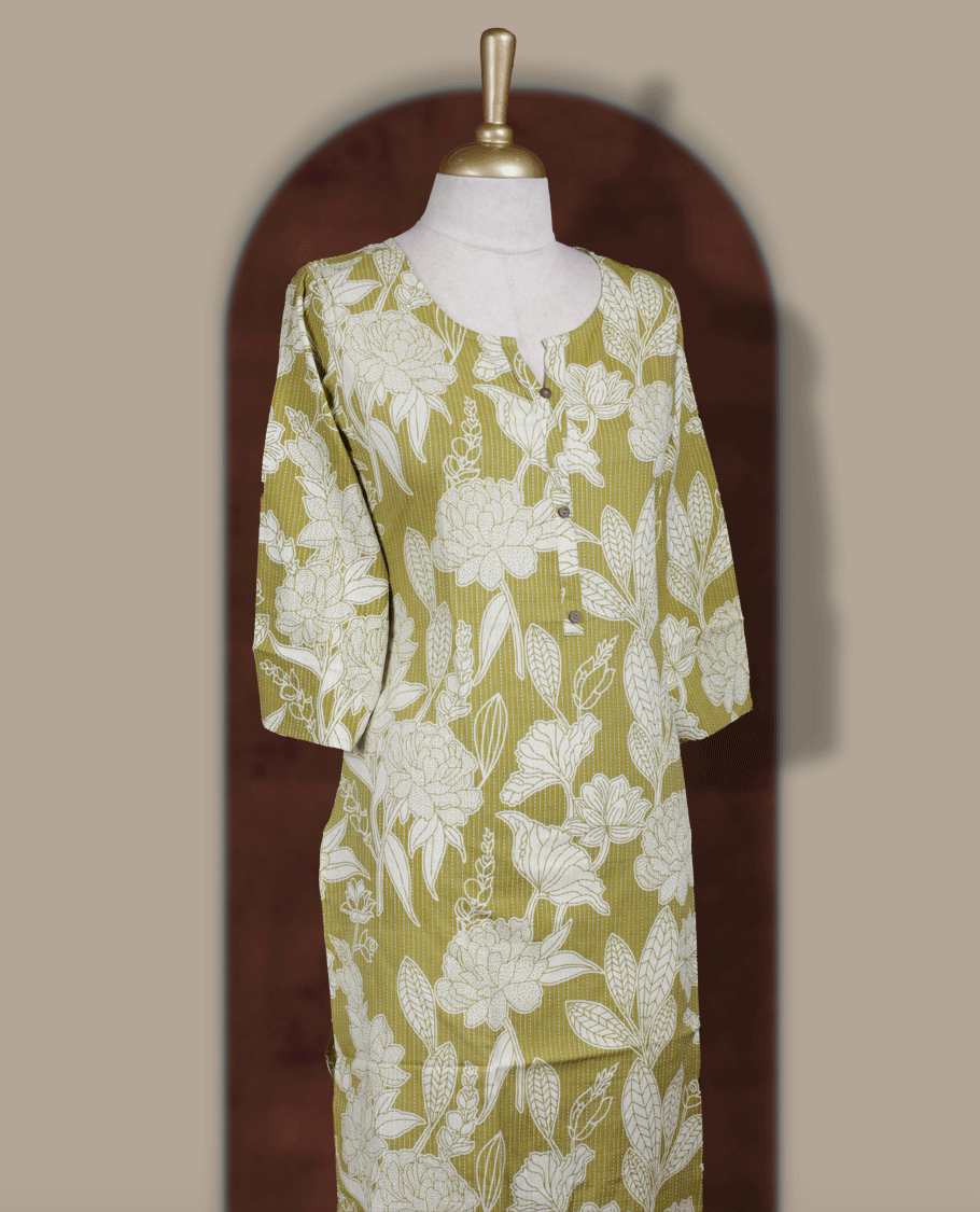 Olive yellow colour colour kurthi adorned with delicate off white floral prints, featuring a stylish V notch round neckline and comfy 3/4th sleeves & Designed in a straight cut silhouette for a graceful, everyday look.