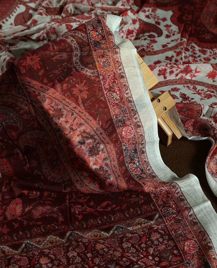 Beige colour churidhar material adorned with delicate floral embroidery and sequin accents, paired with a plain matching bottom and a richly printed dupatta in maroon and rust tones for a graceful ethnic look.