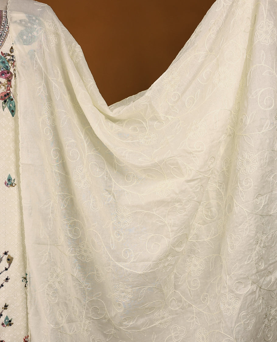 Off-white embroidered top with multi-colour prints & green border, includes matching bottom and threadwork dupatta.