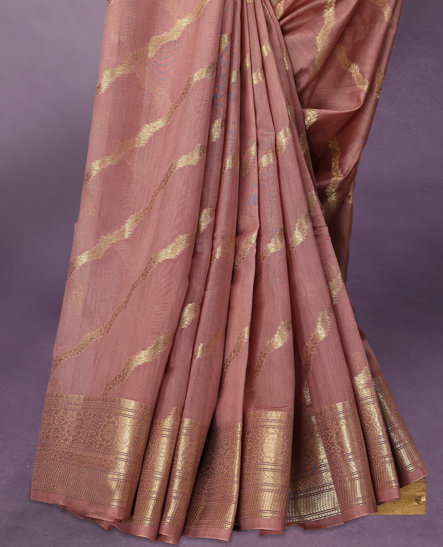 Onion Pink colour pure Banarasi Chanderi cotton, beautifully adorned with traditional antique zari Cross Kodi designs across the body, completed with a hand-dyed colour, a traditional border, and a matching blouse.