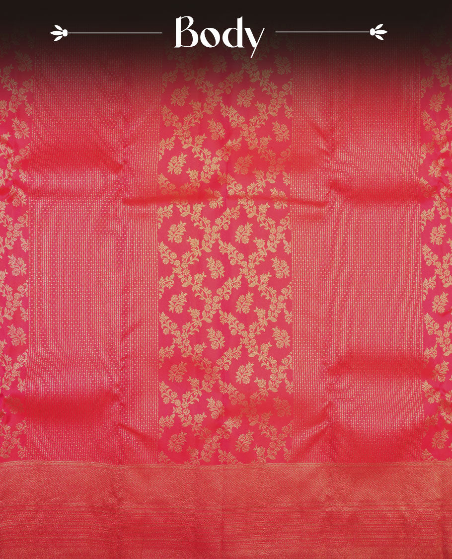Rani pink colour Kanchipuram pattern Manthrakodi saree adorned with geometrical vertical lines with small diamond motifs and banarasi floral weaving on the body, edge to edge zari border and self jacquard blouse piece.