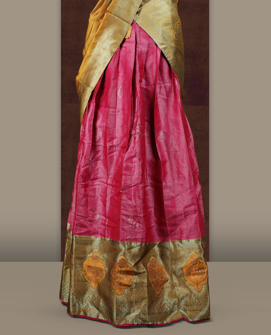Rani Pink and mustard colour Dhavani set featuring a Rani pink colour skirt with contrast Mustard colour border with rich silver zari pattern, paired with a contrasting Mustard dupatta detailed with silver motifs