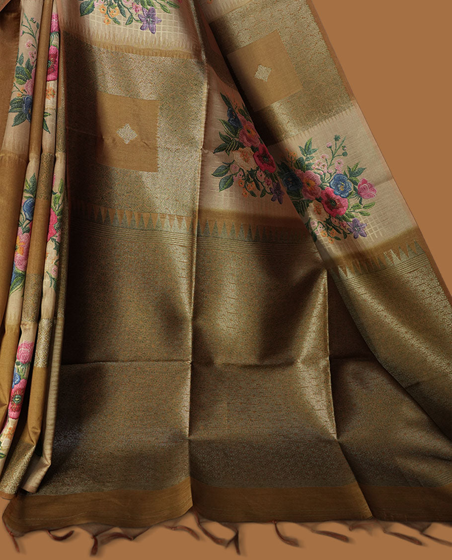 Dark Yellow color semi tussar Banarasi saree featuring vibrant multi-color floral prints across the body, with geometric zari patterns, and a matching blouse detailed with silver woven buttas.
