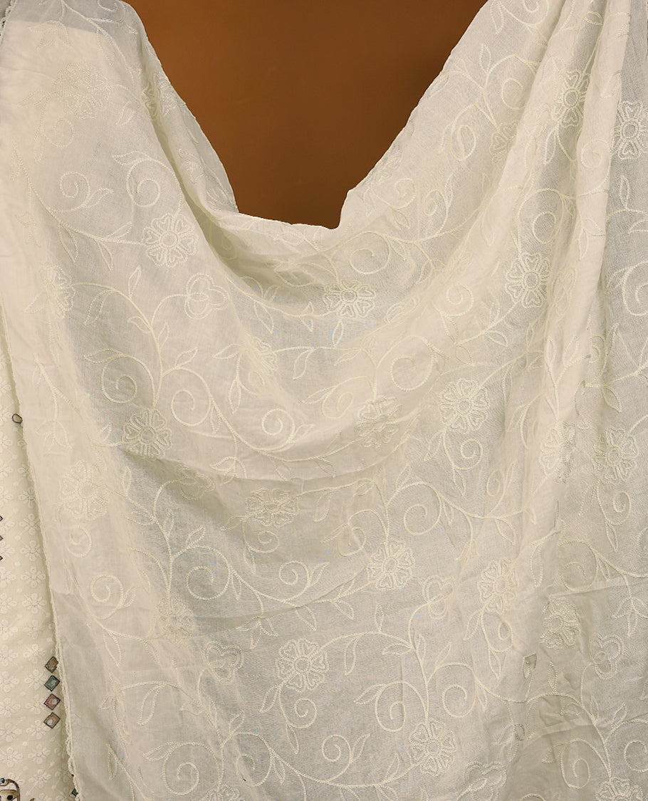 Off-white threadwork top with multi-colour prints and border, paired with a bottom and an embroidered dupatta.