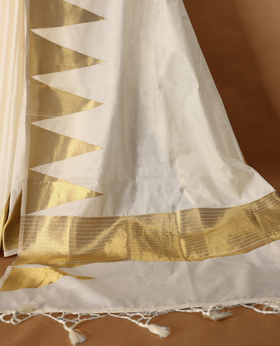 Elegant white colour soft  Tussar Kerala saree featuring Plain body, Gold kasavu Temple border, Paired with matching blouse offering a classic and graceful look