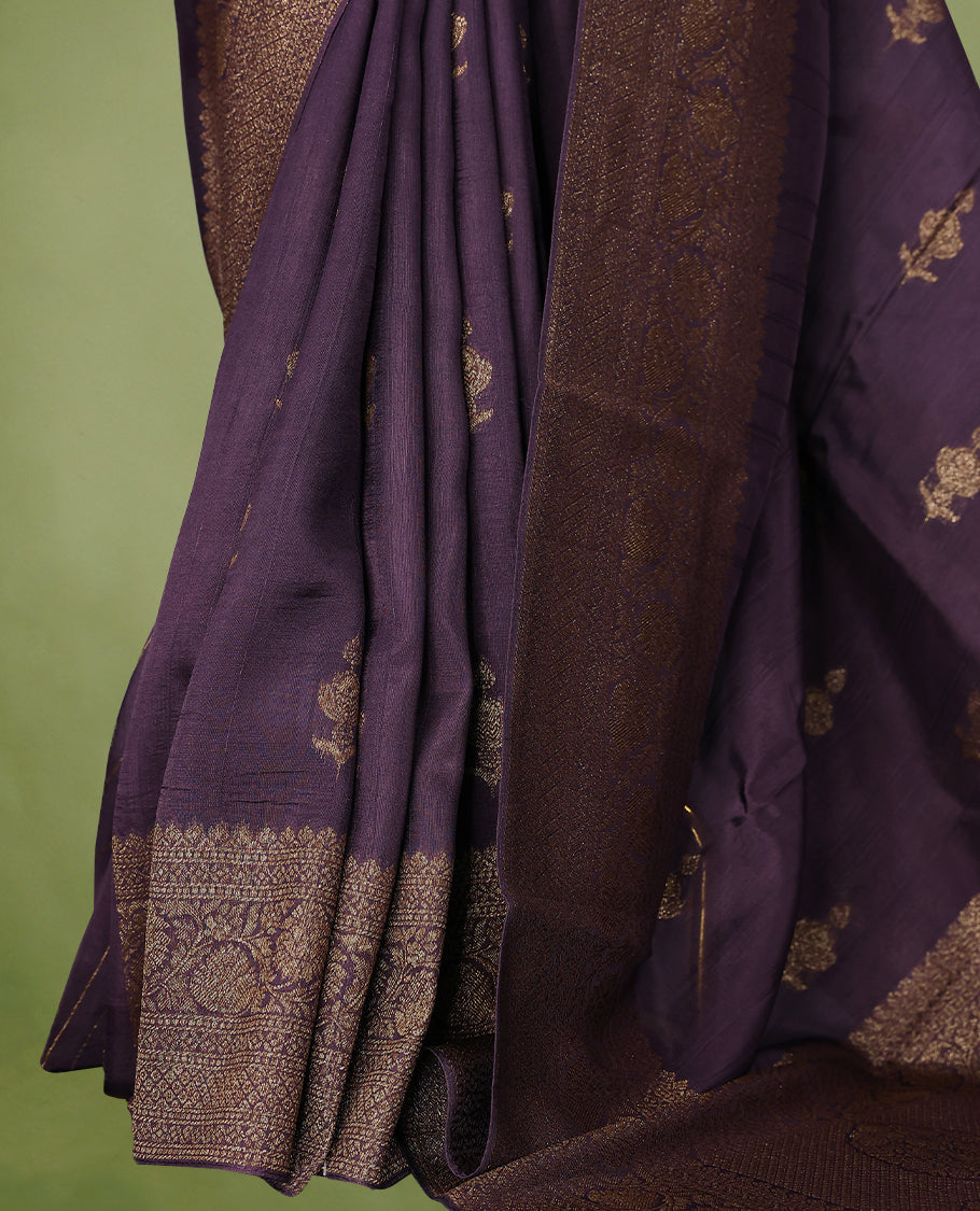 Black Currant semi-Banaras tussar georgette saree embellished with antique zari motifs across the body, complemented by a rich heritage Banaras border and paired with a matching blouse.