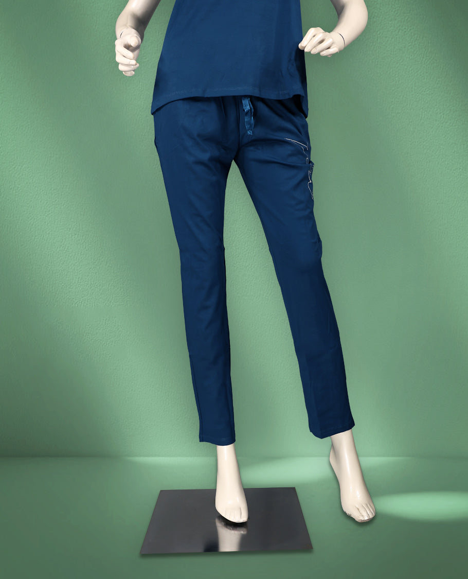 Blue colour women's nightwear set featuring a round-neck, short-sleeve top with a stylish print, paired with matching drawstring pants for a comfortable and coordinated look.