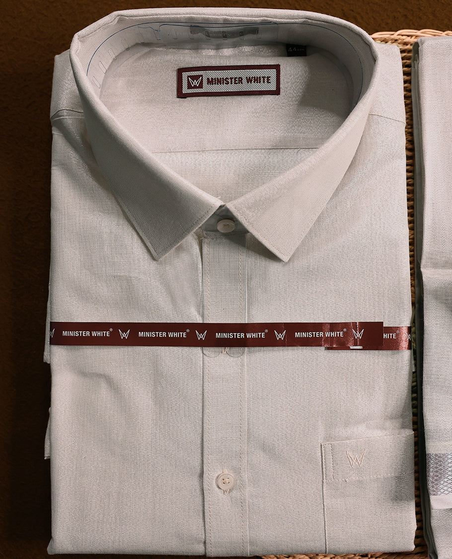 Silver tissue wedding shirt and dhoti set from MINISTER WHITE, adorned with a matching silver zari border.