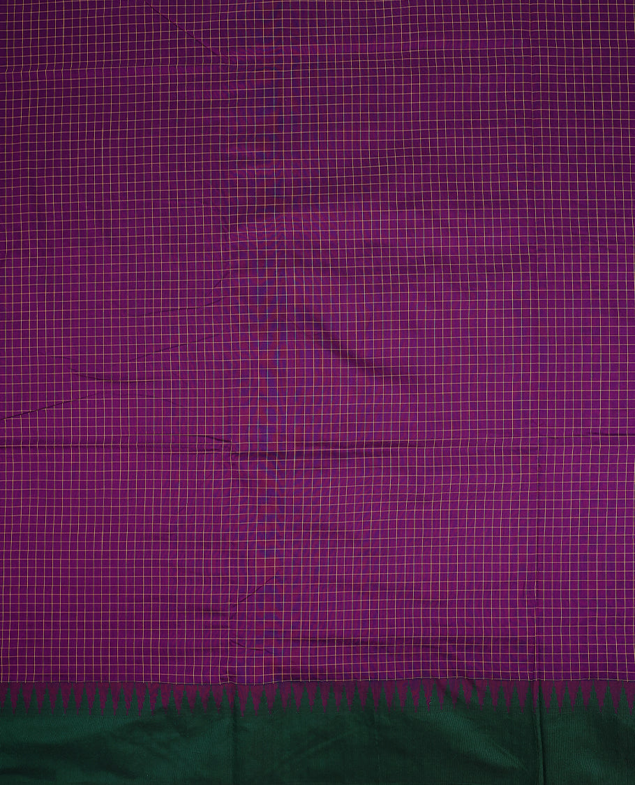 Purple colour mixed Kalyani cotton saree featuring Yellow zari checks throughout the body, paired with a Bottle Green colour traditional border and pallu, with matching blouse