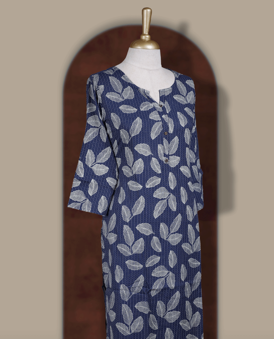 Navy blue colour kurthi adorned with elegant beige colour leaf prints, featuring a stylish V notch round neckline and comfy 3/4th sleeves.