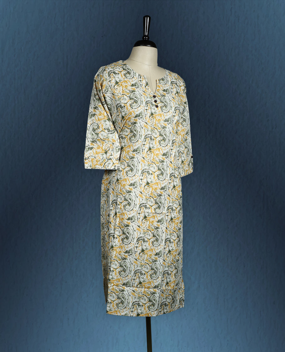 Beige colour kurti with artistic green and mustard swirl print, adorned with wooden buttons along the front placket, featuring a V slit neckline and stylish three quarter sleeves.