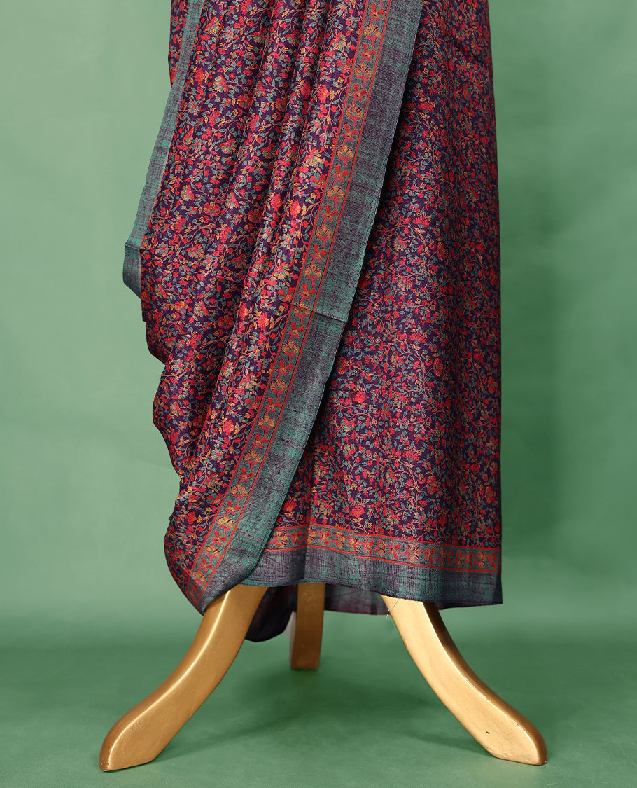 Deep Purple colour Manipuri saree featuring intricate all over floral motifs in vivid tones, framed with a teal and rust red woven border and a matching blouse.