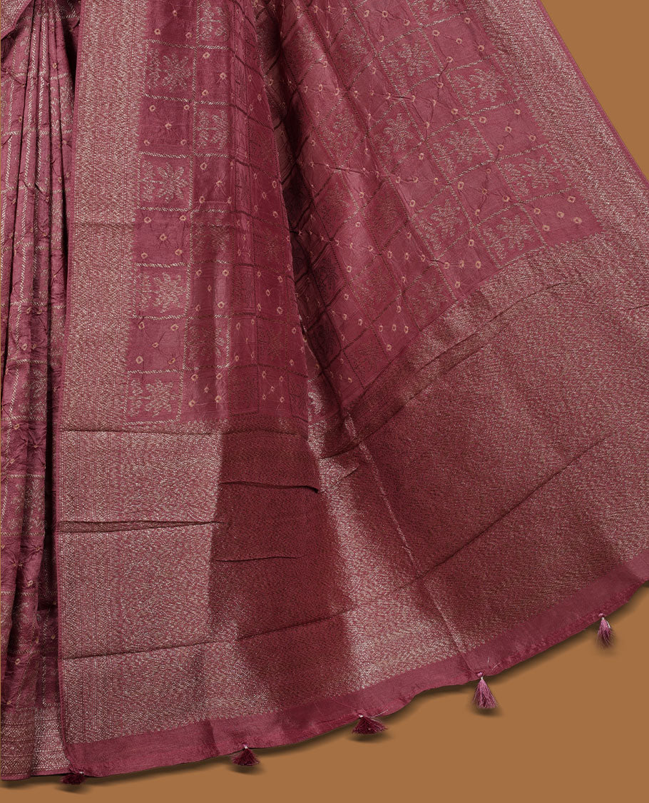 Dark Dusty Pink colour Banarasi Bandhani silk saree featuring with intricate Banarasi motifs on body, complemented by antique zari woven border and grand pallu, paired with matching blouse
