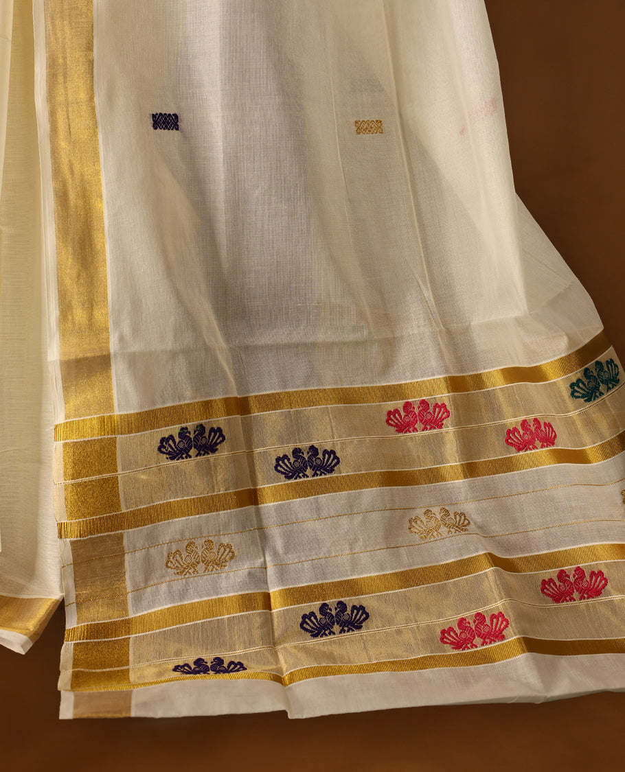 Elegant off white colour cotton Kerala saree featuring Plain body and traditional golden zari kasavu border with multi colour Double peacock Embroidery offering a classic and graceful look, paired with a matching blouse.