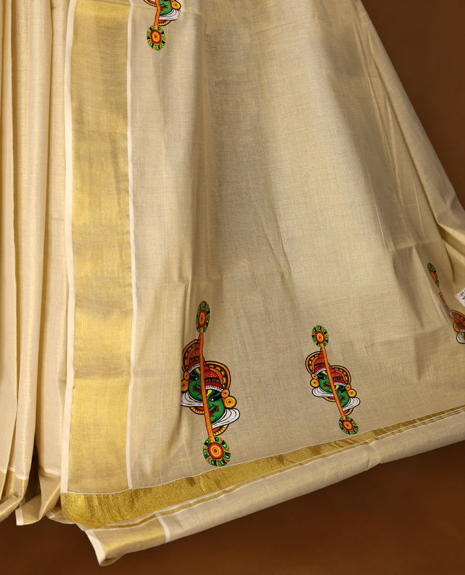 Light Gold colour Tissue Kerala saree featuring Kathakali prints on body and a beautifully woven Gold Kasavu border, paired with a matching blouse perfect for festive occasions.